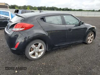 2012 Hyundai Veloster w/Black Int with VIN KMHTC6AD8CU027450, listed as a Copart auction lot 63756415 with 89,037 mi miles and Salvage title. Bid and sale history available at DreamBid. Image 3.