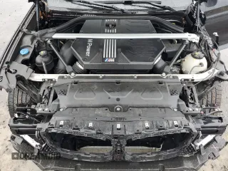 2020 BMW X4 M Competition z VIN 5YMUJ0C01L9C53493, wystawiony jako Copart lot #71828414 z przebiegiem 52 872 mil mil oraz Szkoda całkowita • Salvage title. Historia ofert i sprzedaży dostępna na DreamBid. Obrazek 13.