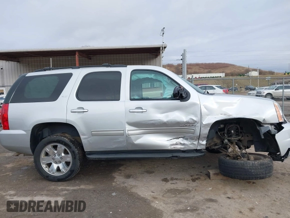 2013 GMC Yukon SLT with VIN 1GKS2CE07DR315820, listed as a IAAI auction lot 41653433 with 137,491 mi miles. Bid and sale history available at carsss.com. Image 13.