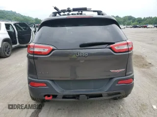 2014 Jeep Cherokee Trailhawk z VIN 1C4PJMBS9EW159721, wystawiony jako Copart lot #60719525 z przebiegiem 136 807 mil mil oraz Szkoda całkowita • Salvage title. Historia ofert i sprzedaży dostępna na DreamBid. Obrazek 6.