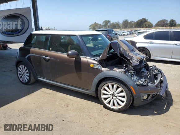 2010 MINI Hardtop with VIN WMWMF3C52ATZ62824, listed as a Copart auction lot 55175395 with 110,585 mi miles and Salvage Title. Bid and sale history available at DreamBid. Image 4.
