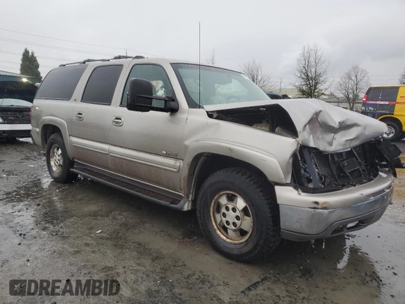 2000 Chevrolet Suburban LS with VIN 3GNFK16TXYG205867, listed as a Copart auction lot 87032424 with 307,632 mi miles and Salvage title. Bid and sale history available at DreamBid. Image 4.