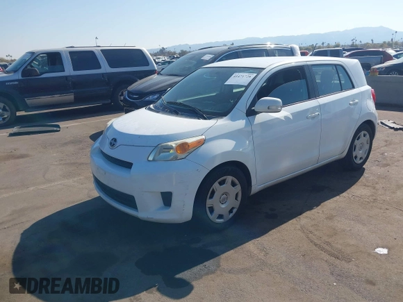 2008 Scion xD with VIN JTKKU10448J011989, listed as a IAAI auction lot 41471728 with 194,281 mi miles. Bid and sale history available at carsss.com. Image 2.