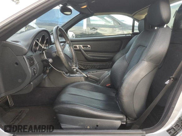 2001 Mercedes-Benz SLK 230 Kompressor with VIN WDBKK49F21F193606, listed as a Copart auction lot 47139945 with 156,424 mi miles and Salvage title. Bid and sale history available at DreamBid. Image 7.