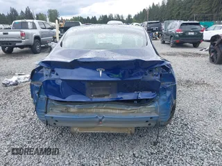 2018 Tesla Model 3 Long Range Battery z VIN 5YJ3E1EBXJF092025, wystawiony jako IAAI lot #42268369 z przebiegiem 132 687 mil mil oraz . Historia ofert i sprzedaży dostępna na DreamBid. Obrazek 17.