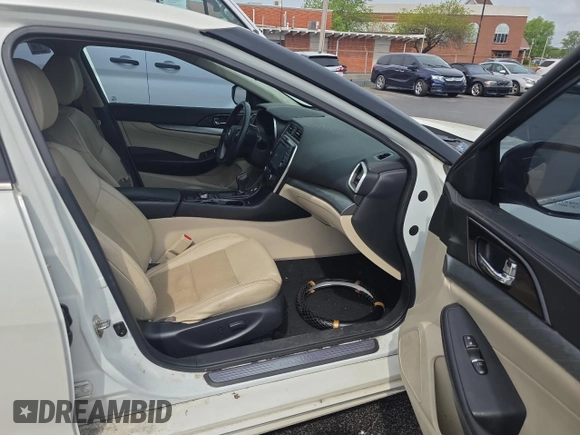 2018 Nissan Maxima SL z VIN 1N4AA6AP2JC371232, wystawiony jako Copart lot #54703405 z przebiegiem 142 447 mil mil oraz Czysty tytuł • Clean title. Historia ofert i sprzedaży dostępna na DreamBid. Obrazek 5.