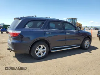 2013 Dodge Durango Crew z VIN 1C4RDJDG5DC651668, wystawiony jako Copart lot #57346645 z przebiegiem 164 987 mil mil oraz Szkoda całkowita • Salvage title. Historia ofert i sprzedaży dostępna na DreamBid. Obrazek 3.