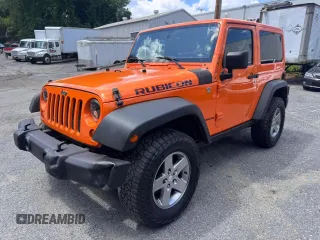 2012 Jeep Wrangler Rubicon with VIN 1C4HJWCG5CL152550, listed as a Copart auction lot 66047195 with 187,458 mi miles and Clean title. Bid and sale history available at DreamBid. Image 2.