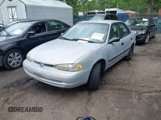 2001 Chevrolet Prizm z VIN 1Y1SK52841Z448303, wystawiony jako IAAI lot #42224410 z przebiegiem 160 577 mil mil oraz . Historia ofert i sprzedaży dostępna na DreamBid. Obrazek 2.