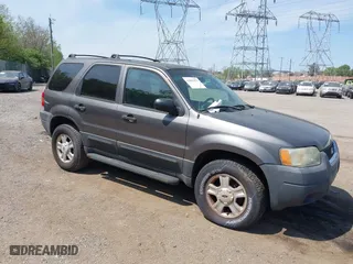 2004 Ford Escape XLT with VIN 1FMCU93134KB07995, listed as a IAAI auction lot 42092979 with 166,074 mi miles. Bid and sale history available at carsss.com. Image 1.