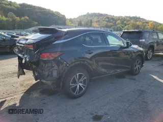 2023 Lexus RX with VIN 2T2BAMCA2PC013409, listed as a Copart auction lot 71721004 with 10,615 mi miles and Salvage Title. Bid and sale history available at carsss.com. Image 3.