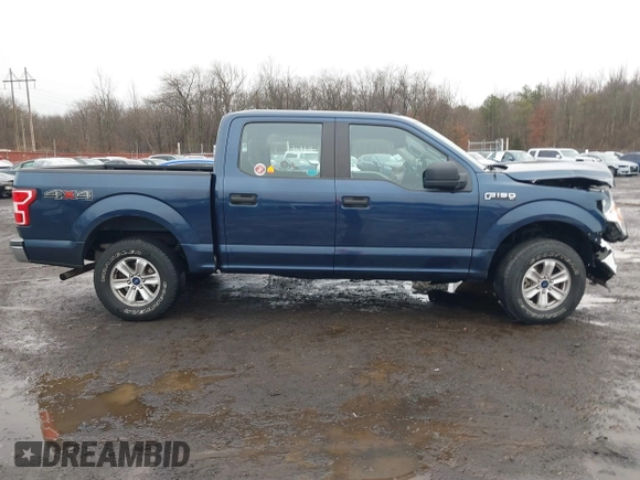 2019 Ford F-150 XL with VIN 1FTEW1EB3KFB10433, listed as a IAAI auction lot 41520139 with 104,405 mi miles and . Bid and sale history available at DreamBid. Image 13.