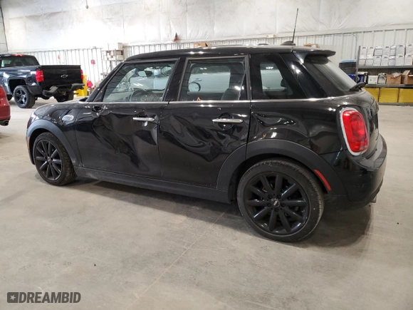 2021 MINI Hardtop 4 Door Oxford Edition with VIN WMWXU7C00M2N49230, listed as a Copart auction lot 77797914 with 51,877 mi miles and Salvage Title. Bid and sale history available at carsss.com. Image 2.