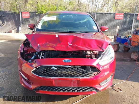 2016 Ford Focus SE with VIN 1FADP3F29GL347574, listed as a IAAI auction lot 41975094 with 76,147 mi miles. Bid and sale history available at carsss.com. Image 12.