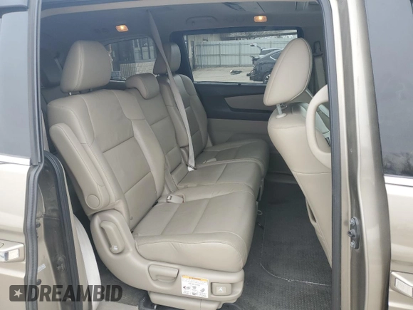 2012 Honda Odyssey Touring with VIN 5FNRL5H9XCB078399, listed as a Copart auction lot 52360165 with 174,819 mi miles and Salvage Title. Bid and sale history available at DreamBid. Image 12.
