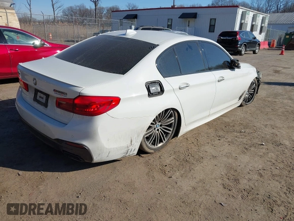 2018 BMW 5 Series M550i xDrive with VIN WBAJB9C53JB036097, listed as a IAAI auction lot 41743031 with 70,164 mi miles and . Bid and sale history available at carsss.com. Image 4.