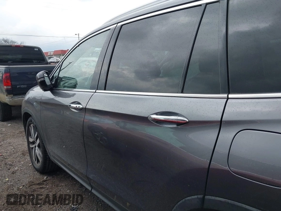 2016 Honda Pilot Touring with VIN 5FNYF6H93GB003106, listed as a IAAI auction lot 41989772 with 110,123 mi miles. Bid and sale history available at carsss.com. Image 14.