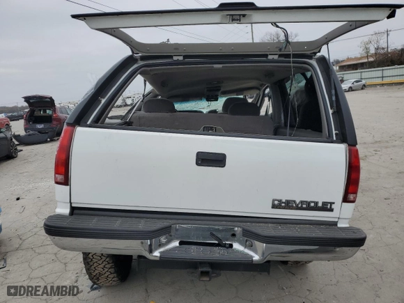 1999 Chevrolet Tahoe with VIN 3GNEK18R7XG230110, listed as a Copart auction lot 82932774 with 148,055 mi miles and Salvage Title. Bid and sale history available at carsss.com. Image 6.