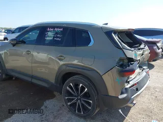 2024 Mazda CX-50 Premium z VIN 7MMVABDYXRN229669, wystawiony jako IAAI lot #41999385 z przebiegiem 10 882 mil mil oraz . Historia ofert i sprzedaży dostępna na DreamBid. Obrazek 3.