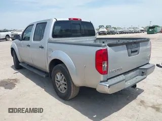 2015 Nissan Frontier SL with VIN 1N6AD0ER5FN768808, listed as a IAAI auction lot 42257992 with 151,852 mi miles and . Bid and sale history available at DreamBid. Image 3.