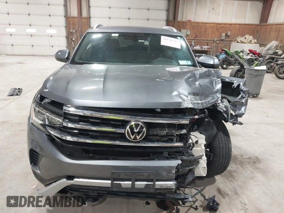 2022 Volkswagen Atlas SE z VIN 1V2KE2CA1NC206765, wystawiony jako IAAI lot #41876747 z przebiegiem 83 304 mil mil oraz . Historia ofert i sprzedaży dostępna na DreamBid. Obrazek 12.