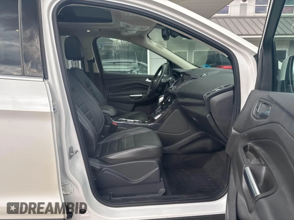 2014 Ford Escape Titanium with VIN 1FMCU9J94EUC63638, listed as a IAAI auction lot 42196241 with 198,112 mi miles and . Bid and sale history available at DreamBid. Image 5.
