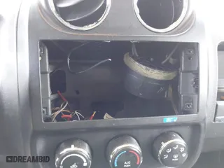 2014 Jeep Patriot Sport with VIN 1C4NJRBB1ED811019, listed as a IAAI auction lot 42039895 with 124,837 mi miles. Bid and sale history available at carsss.com. Image 6.