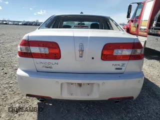 2009 Lincoln MKZ z VIN 3LNHM28T39R629987, wystawiony jako Copart lot #50097385 z przebiegiem 132 144 mil mil oraz Szkoda całkowita • Salvage title. Historia ofert i sprzedaży dostępna na DreamBid. Obrazek 6.