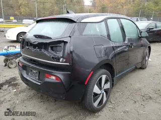 2018 BMW i3 with VIN WBY7Z4C52JVC34780, listed as a Copart auction lot 64986792 with 0 mi miles. Bid and sale history available at carsss.com. Image 4.