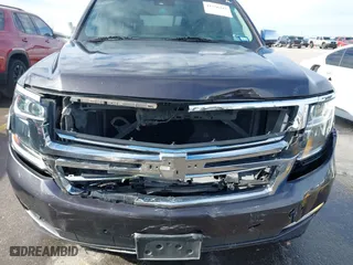 2015 Chevrolet Tahoe LTZ with VIN 1GNSCCKC8FR617540, listed as a IAAI auction lot 41356342 with 118,268 mi miles. Bid and sale history available at carsss.com. Image 6.