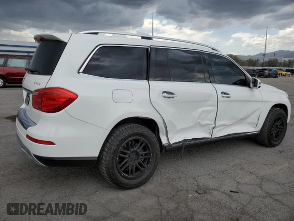 2014 Mercedes-Benz GL 450 z VIN 4JGDF7CE4EA314084, wystawiony jako Copart lot #59593195 z przebiegiem 161 026 mil mil oraz Szkoda całkowita • Salvage title. Historia ofert i sprzedaży dostępna na DreamBid. Obrazek 3.