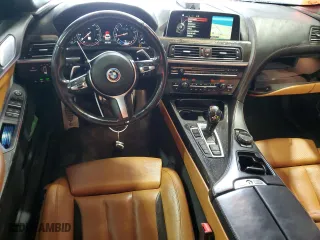 2016 BMW 6 Series 650i xDrive with VIN WBA6D6C55GGF94711, listed as a Copart auction lot 52917475 with 103,965 mi miles and Non Repairable. Bid and sale history available at carsss.com. Image 8.
