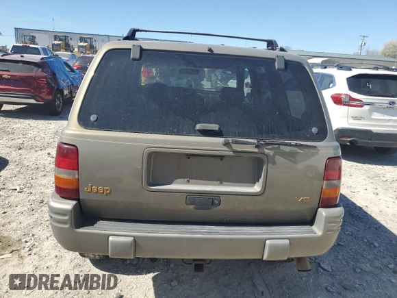 1997 Jeep Grand Cherokee Limited with VIN 1J4GZ78Y4VC567237, listed as a Copart auction lot 49059105 with 177,478 mi miles and Salvage Title. Bid and sale history available at carsss.com. Image 6.