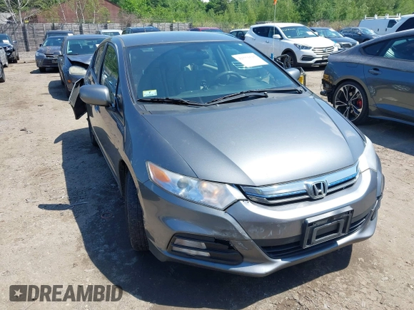 2013 Honda Insight with VIN JHMZE2H31DS002352, listed as a IAAI auction lot 42551515 with 148,393 mi miles and . Bid and sale history available at DreamBid. Image 1.