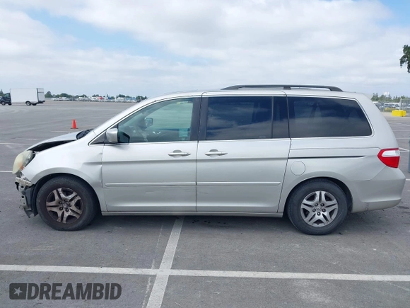 2005 Honda Odyssey EX-L with VIN 5FNRL38745B075486, listed as a IAAI auction lot 42080772 with 197,158 mi miles and . Bid and sale history available at DreamBid. Image 14.