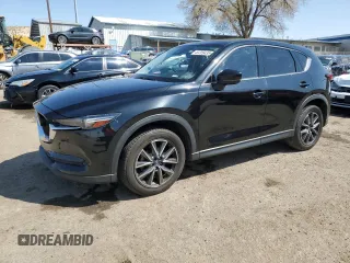 2018 Mazda CX-5 Grand Touring with VIN JM3KFADM9J1336792, listed as a Copart auction lot 52209435 with 107,852 mi miles and Salvage Title. Bid and sale history available at DreamBid. Image 1.