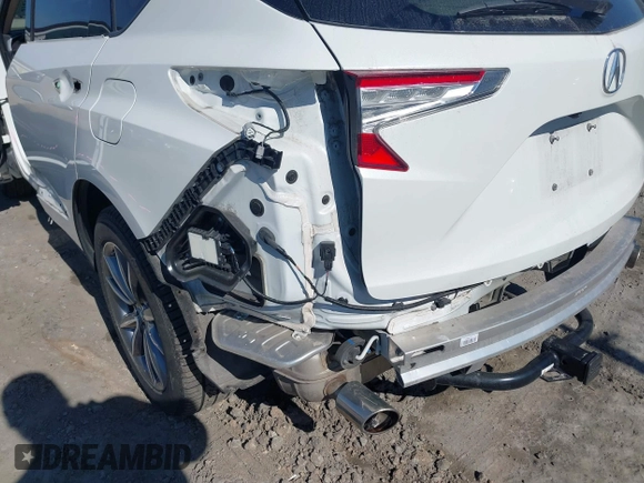 2020 Acura RDX Technology with VIN 5J8TC1H52LL006185, listed as a IAAI auction lot 41457828 with 59,998 mi miles and . Bid and sale history available at DreamBid. Image 19.