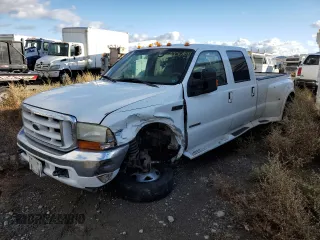 2001 Ford F-350 XL with VIN 1FTWW32F31ED39867, listed as a Copart auction lot 80069644 with 241,113 mi miles and Salvage title. Bid and sale history available at DreamBid. Image 1.