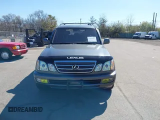 2003 Lexus LX with VIN JTJHT00W033531066, listed as a IAAI auction lot 41969617 with 209,710 mi miles. Bid and sale history available at carsss.com. Image 12.