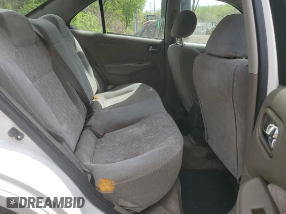 2002 Nissan Sentra GXE z VIN 3N1CB51A62L552428, wystawiony jako Copart lot #53680465 z przebiegiem 139 006 mil mil oraz Szkoda całkowita • Salvage title. Historia ofert i sprzedaży dostępna na DreamBid. Obrazek 10.