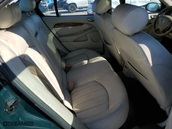 2002 Jaguar X-Type with VIN SAJEA51C12WC33477, listed as a Copart auction lot 83711124 with 165,637 mi miles and Salvage Title. Bid and sale history available at carsss.com. Image 10.