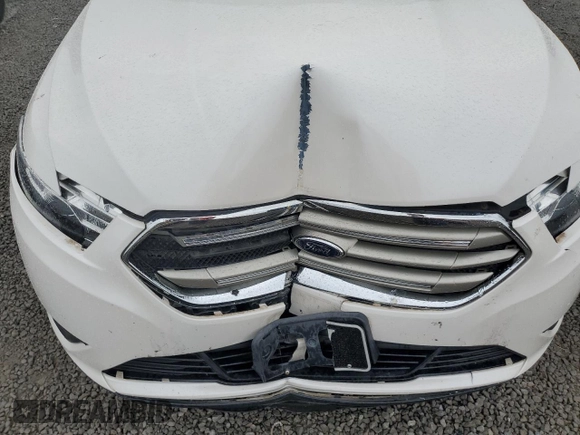 2016 Ford Taurus SEL z VIN 1FAHP2E87GG146931, wystawiony jako Copart lot #56135655 z przebiegiem 99 733 mil mil oraz Szkoda całkowita • Salvage title. Historia ofert i sprzedaży dostępna na DreamBid. Obrazek 11.