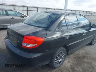 2005 Kia Rio with VIN KNADC125X56377797, listed as a IAAI auction lot 41685739 with 103,390 mi miles. Bid and sale history available at carsss.com. Image 4.