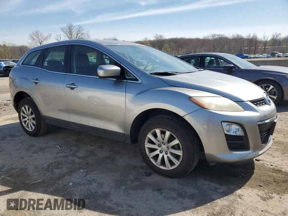 2012 Mazda CX-7 i SV z VIN JM3ER2AM2C0412683, wystawiony jako Copart lot #53774075 z przebiegiem 196 344 mil mil oraz Czysty tytuł • Clean title. Historia ofert i sprzedaży dostępna na DreamBid. Obrazek 4.