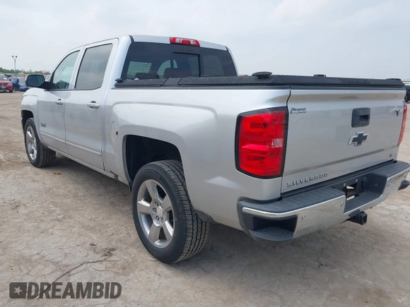 2018 Chevrolet Silverado 1500 LT with VIN 3GCPCREC8JG645232, listed as a IAAI auction lot 41927715 with 95,601 mi miles and . Bid and sale history available at DreamBid. Image 3.