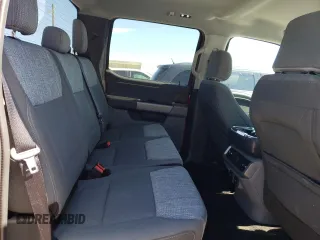 2023 Ford F-150 Lightning Pro z VIN 1FTVW1EL5PWG08844, wystawiony jako Copart lot #57673505 z przebiegiem 20 001 mil mil oraz Szkoda całkowita • Salvage title. Historia ofert i sprzedaży dostępna na DreamBid. Obrazek 10.