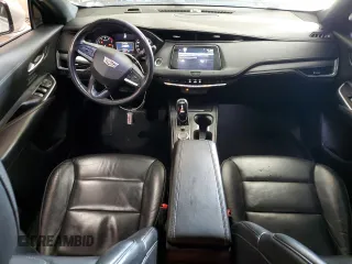 2021 Cadillac XT4 AWD Premium Luxury with VIN 1GYFZDR4XMF067733, listed as a Copart auction lot 47523055 with 109,727 mi miles and Salvage Title. Bid and sale history available at carsss.com. Image 8.