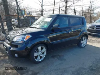 2010 Kia Soul + with VIN KNDJT2A22A7114453, listed as a IAAI auction lot 41597098 with 129,575 mi miles. Bid and sale history available at carsss.com. Image 2.