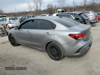 2023 Kia Rio S with VIN 3KPA24AD3PE517933, listed as a Copart auction lot 41072394 with 26,058 mi miles and Salvage Title. Bid and sale history available at DreamBid. Image 2.