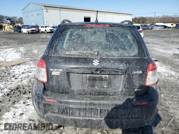 2013 Suzuki SX4 Crossover z VIN JS2YB5A39D6100013, wystawiony jako Copart lot #42423105 z przebiegiem 167 398 mil mil oraz Szkoda całkowita • Salvage title. Historia ofert i sprzedaży dostępna na DreamBid. Obrazek 6.